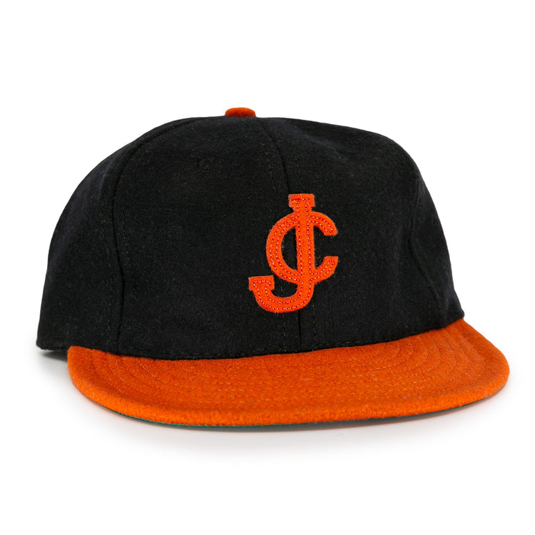 The EFF Jersey City Skeeters 1928 Vintage Ballcap features a black body, orange brim, and an embroidered orange JC logo—ideal for fans after a classic look.