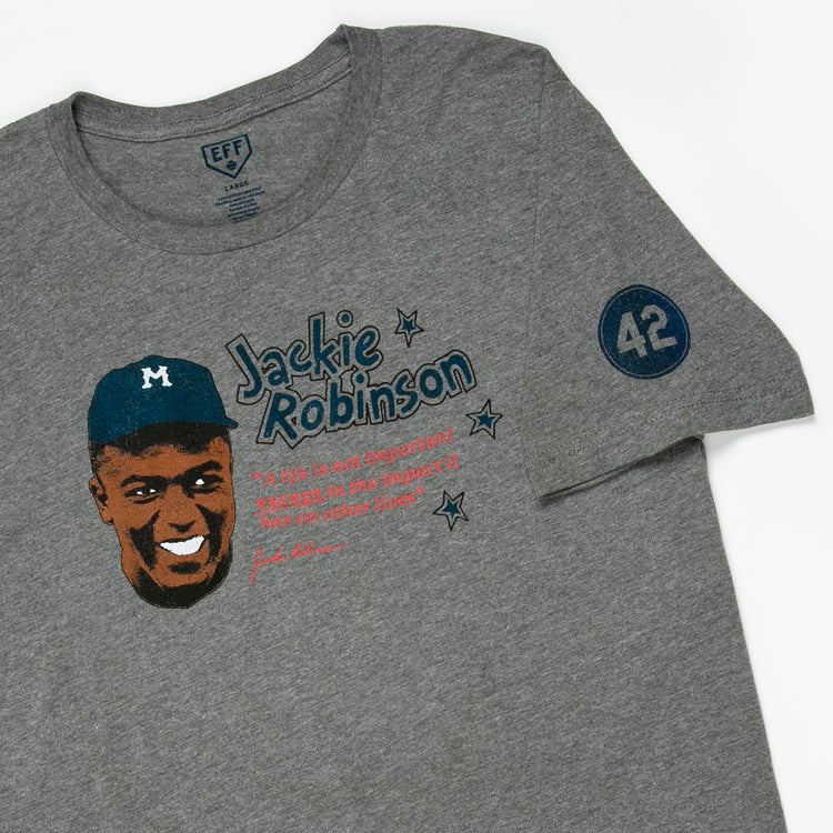 The Ebbets Field Flannels Jackie Robinson Illustration T-Shirt is a unisex heathered gray tee featuring his portrait in a cap, name, an inspiring quote, and the number 42 printed on the left sleeve.