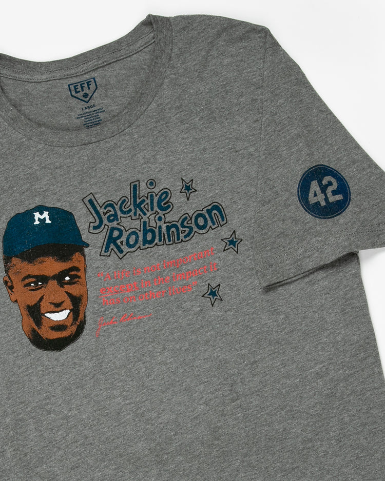 The Ebbets Field Flannels Jackie Robinson Illustration T-Shirt is a unisex heathered gray tee featuring his portrait in a cap, name, an inspiring quote, and the number 42 printed on the left sleeve.