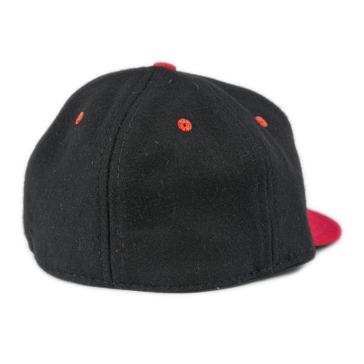 The EFF University of Maryland 1939 Vintage Ballcap is a black cap with red ventilation holes and a striking red brim, shown from the back.