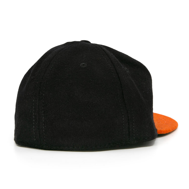 The Marianao Tigres 1950 Vintage Ballcap by Ebbets Field Flannels is shown from the back, highlighting visible stitching and an orange brim at the front—a tribute to classic Cuban Professional League baseball hat designs.