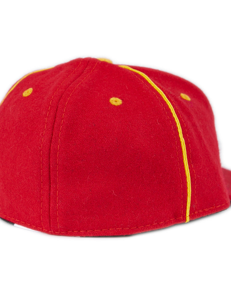 The EFF University of Maryland 1962 Vintage Ballcap in red features yellow stitching and embroidered eyelets, shown from the back and side on a white background.