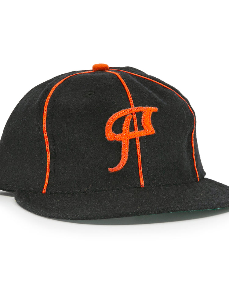 The EFF Montreal Black Panthers 1936 Vintage Ballcap is a black cap with orange piping, a stylized P on the front, flat brim, and small orange top button—classic Quebec Provincial League style.