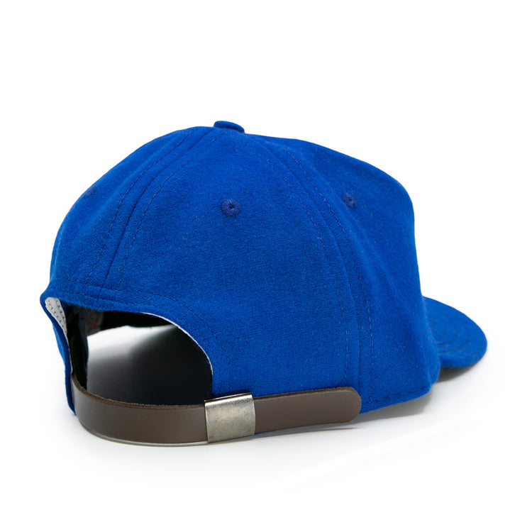 The EFF Memphis Red Sox 1944 Vintage Ballcap is a blue wool cap shown from the back, featuring a brown adjustable strap with a silver buckle, curved brim, visible stitching, and classic styling.