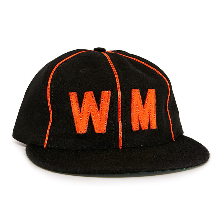 The EFF Wichita Monrovians 1925 Vintage Ballcap is a black cap with bright orange piping and a large orange embroidered WM on the front, inspired by the classic teams original design.
