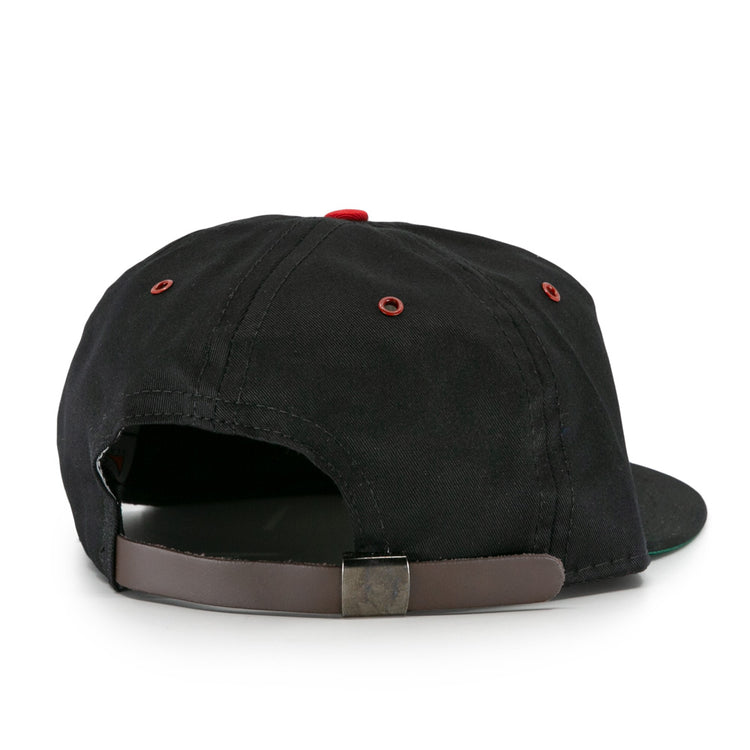The EFF Memphis Red Sox Cotton Twill Ballcap is black with a brown adjustable strap, metal buckle, and red stitching around the ventilation holes, inspired by the classic Negro American League design.