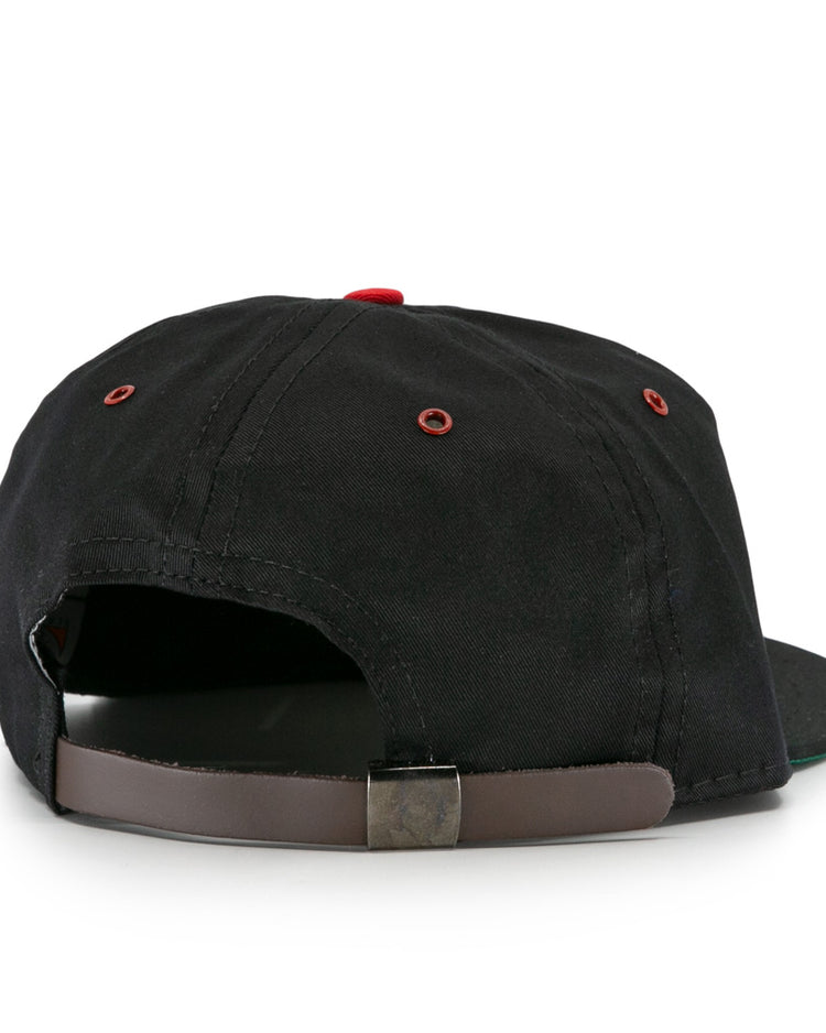 The EFF Memphis Red Sox Cotton Twill Ballcap is black with a brown adjustable strap, metal buckle, and red stitching around the ventilation holes, inspired by the classic Negro American League design.
