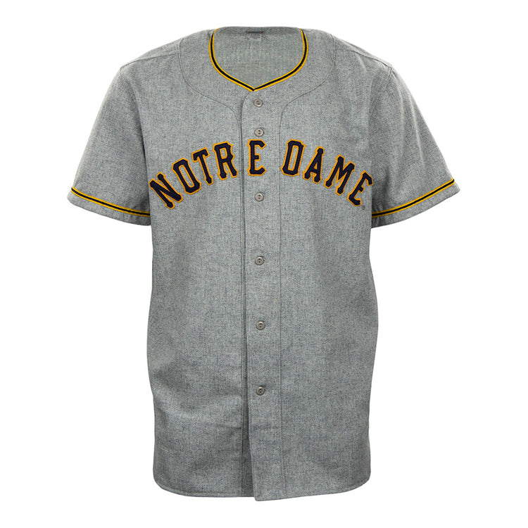 The EFF University of Notre Dame 1956 Road Jersey is a gray authentic jersey with NOTRE DAME in bold black and gold, plus matching trim—perfect for fans wanting a classic collegiate team look.