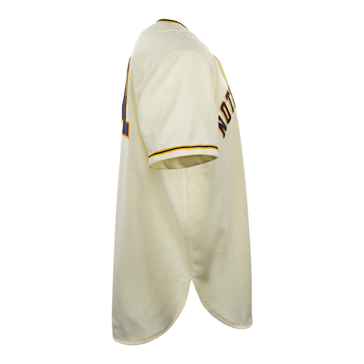 Side view of an authentic cream-colored University of Notre Dame 1956 Home Jersey by EFF, featuring yellow and black trim on the sleeve and collar, with partially visible text and numbers on the back and sleeve.