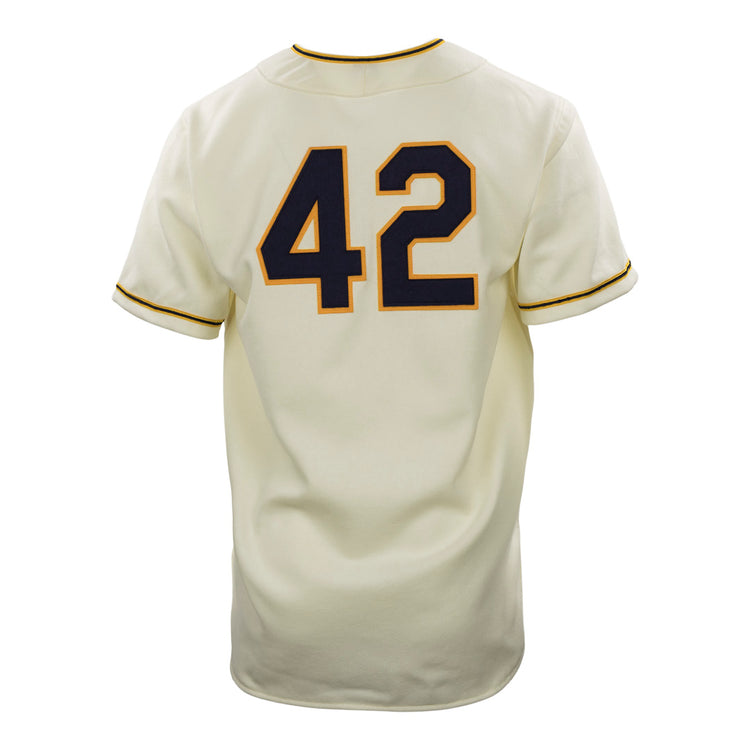 A cream-colored EFF University of Notre Dame 1956 Home Jersey shown from the back, featuring a large dark blue number 42 with a gold outline.