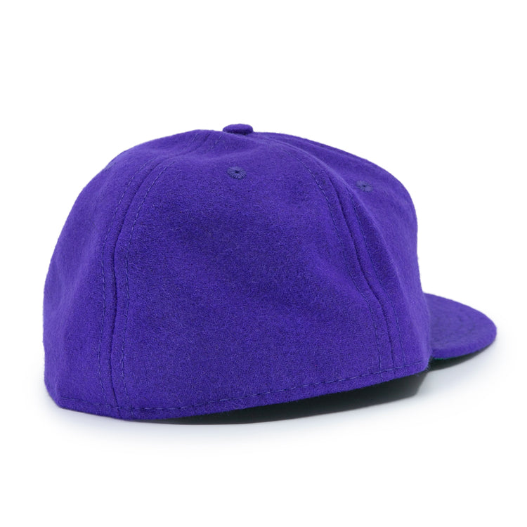 The EFF Northwestern University 1961 Vintage Ballcap is a purple wool cap with a flat brim, seen from the back and side, with no visible logos—perfect for fans who love a timeless, classic look.