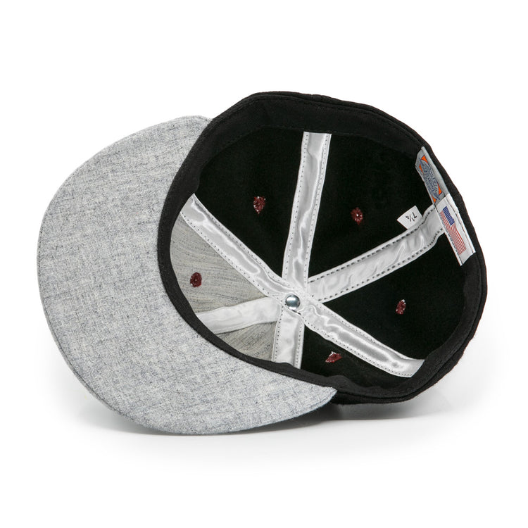 Inside view of the EFF Nashville Stars 2021 Road Ballcap: black and silver lining, red crown stitching, visible size tag and US flag label. The brim is flat and light gray.