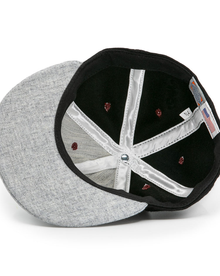 Inside view of the EFF Nashville Stars 2021 Road Ballcap: black and silver lining, red crown stitching, visible size tag and US flag label. The brim is flat and light gray.