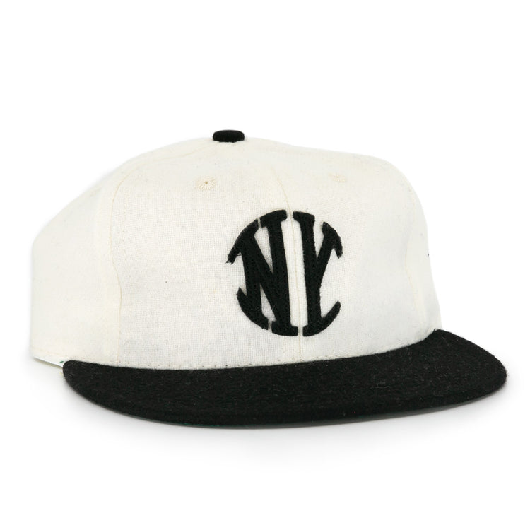 The EFF New York Knickerbockers Vintage Inspired Ballcap features a white crown, black brim, and black embroidered NY logo—a classic look for vintage baseball hat fans.