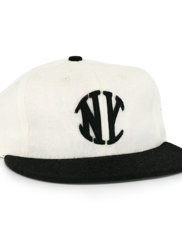 The EFF New York Knickerbockers Vintage Inspired Ballcap features a white crown, black brim, and black embroidered NY logo—a classic look for vintage baseball hat fans.