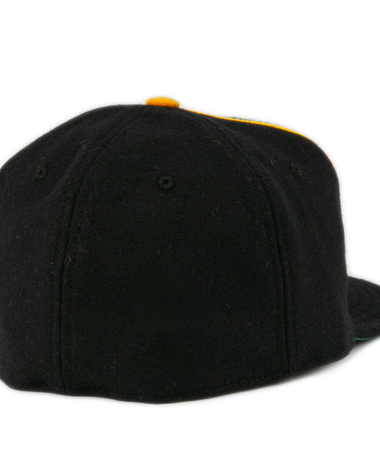 The EFF Oakland Caskets Co. 1938 Vintage Ballcap is a black cap with a flat brim, shown from the back and featuring a clean, logo-free design.