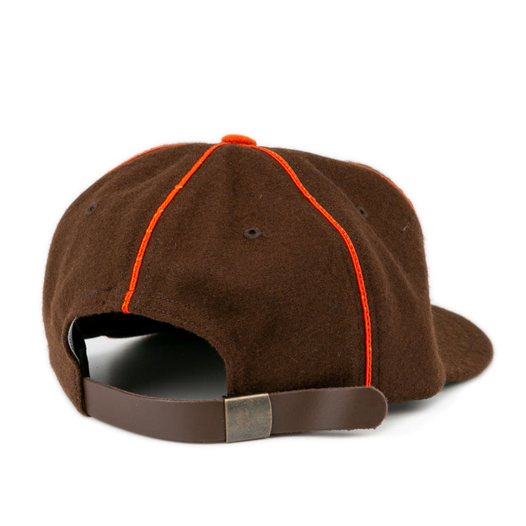 The EFF Pocatello Bannocks 1952 Vintage Ballcap is shown from the back, highlighting orange seam stitching and an adjustable leather strap with a metal buckle.