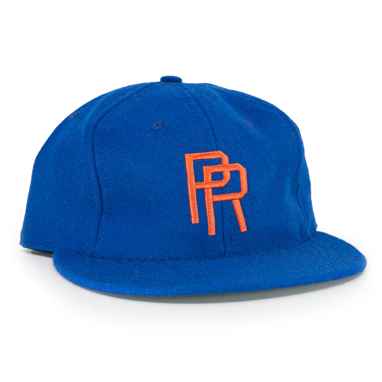 The EFF Puerto Rico Marlins 1961 Vintage Ballcap is a royal blue wool hat with an orange PR logo embroidered on the front. Its structured crown and flat brim capture classic Marlins style.