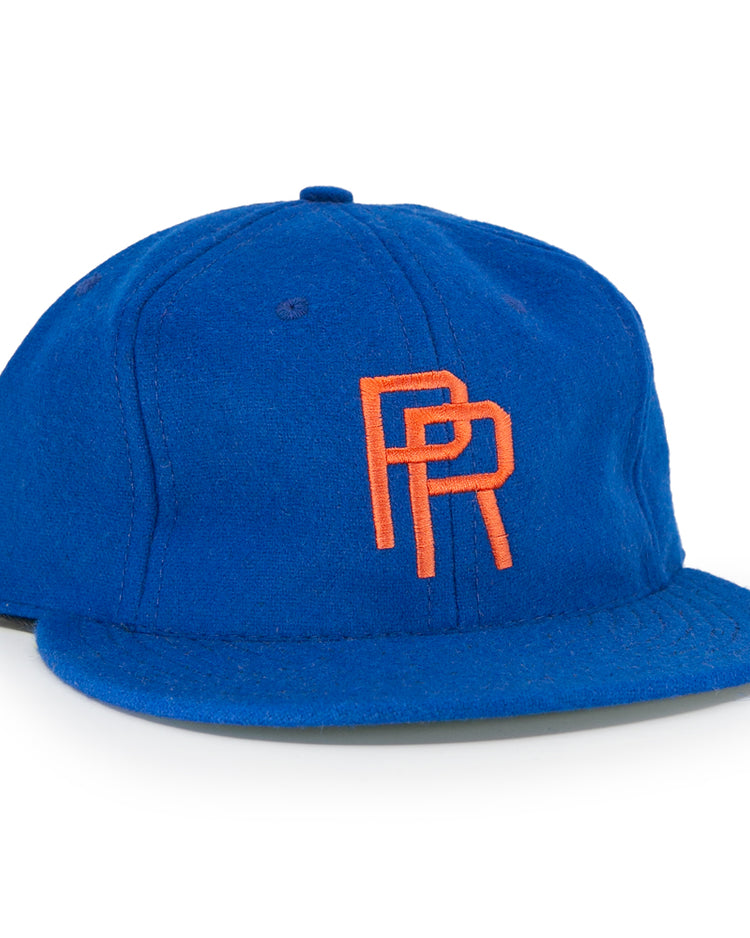 The EFF Puerto Rico Marlins 1961 Vintage Ballcap is a royal blue wool hat with an orange PR logo embroidered on the front. Its structured crown and flat brim capture classic Marlins style.