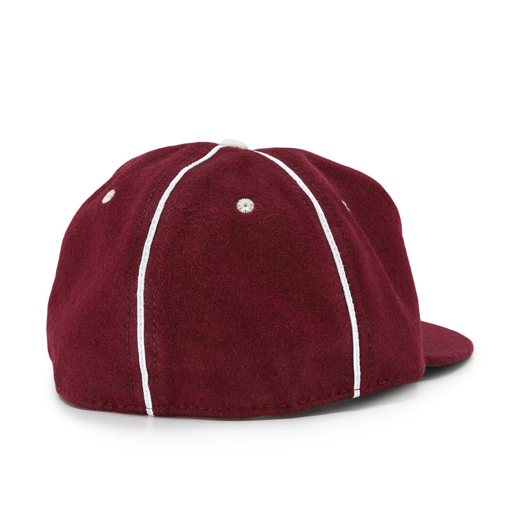 The EFF Quebec Athletics 1941 Vintage Ballcap is shown from the back in maroon wool, featuring white vertical piping and stitched eyelets on each panel.