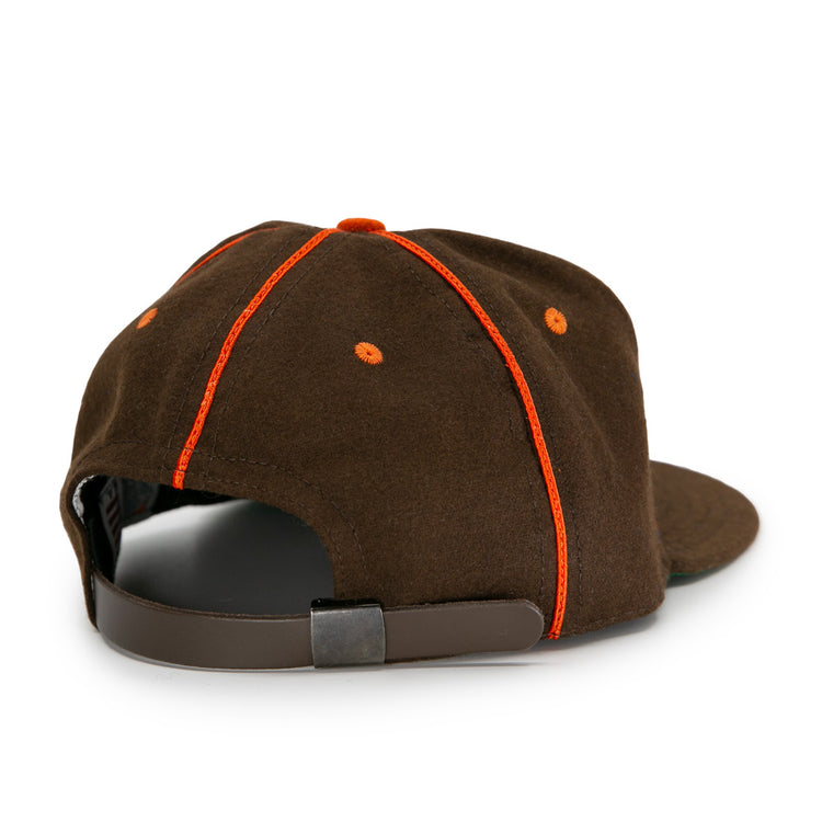 The EFF San Antonio Missions 1939 Vintage Ballcap features brown fabric with orange stitching, retro accents, and an adjustable strap with a metal clasp, inspired by the classic 1939 ballcap and shown from the back.