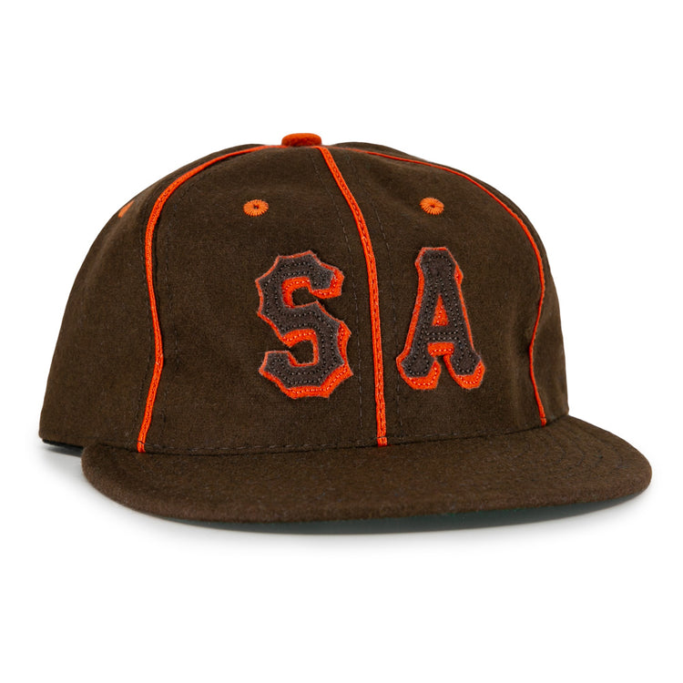 The EFF San Antonio Missions 1939 Vintage Ballcap is a brown wool cap with orange piping and bold orange and black embroidered S and A, styled after the historic teams original design.