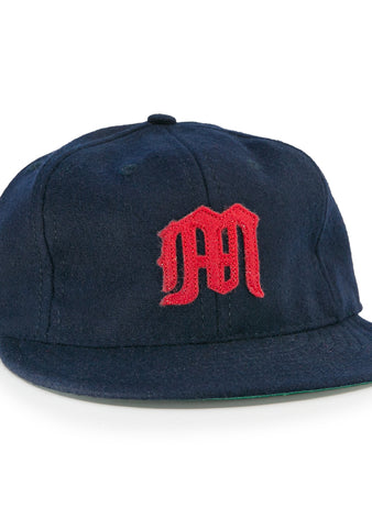 The EFF San Francisco Missions 1935 Vintage Ballcap is a navy blue wool cap featuring a red embroidered M logo, inspired by the original teams classic design.