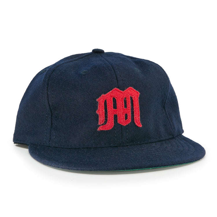 The EFF San Francisco Missions 1935 Vintage Ballcap is a navy blue wool cap featuring a red embroidered M logo, inspired by the original teams classic design.