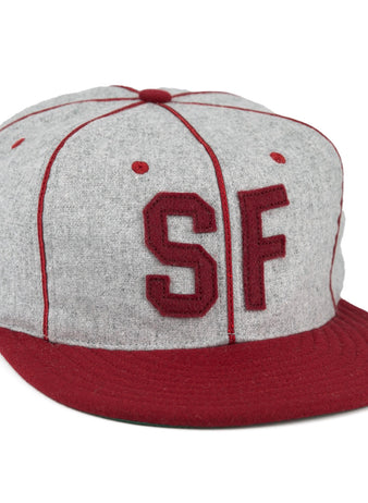 The EFF San Francisco Post Office 1939 Vintage Ballcap is a genuine wool cap in gray with a red brim, red stitching, and bold red SF letters on the front—capturing classic San Francisco style.