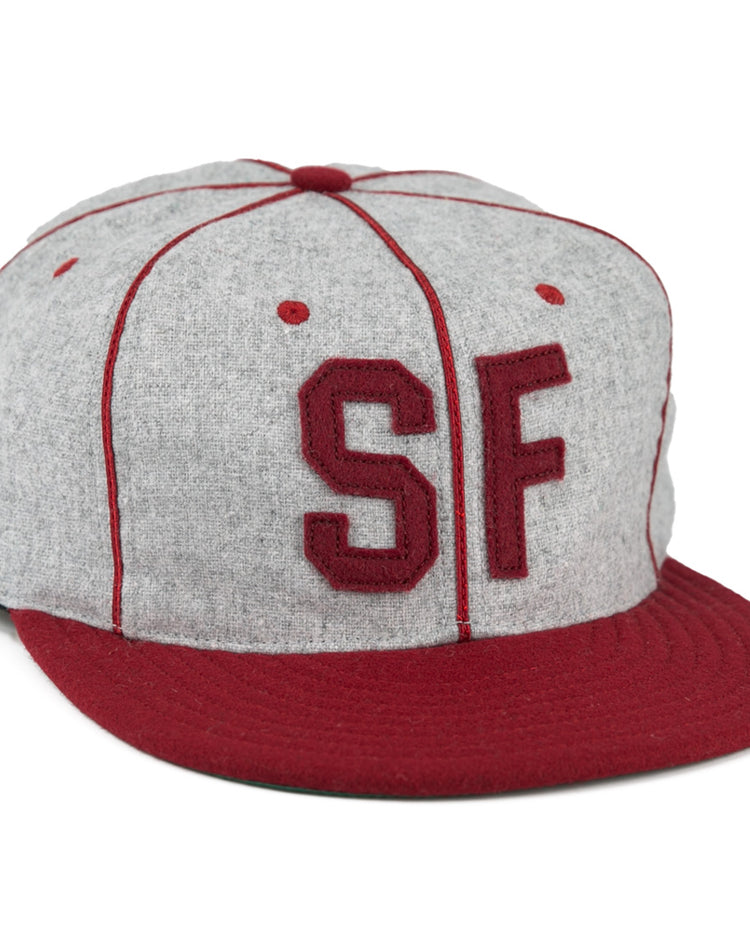 The EFF San Francisco Post Office 1939 Vintage Ballcap is a genuine wool cap in gray with a red brim, red stitching, and bold red SF letters on the front—capturing classic San Francisco style.