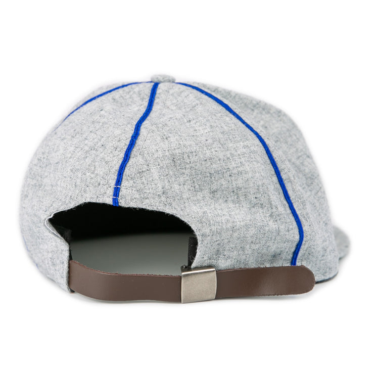The EFF Southern Methodist University 1941 Vintage Ballcap, shown from the back on a white background, features gray fabric with blue stitching and an adjustable brown leather strap with a metal clasp.