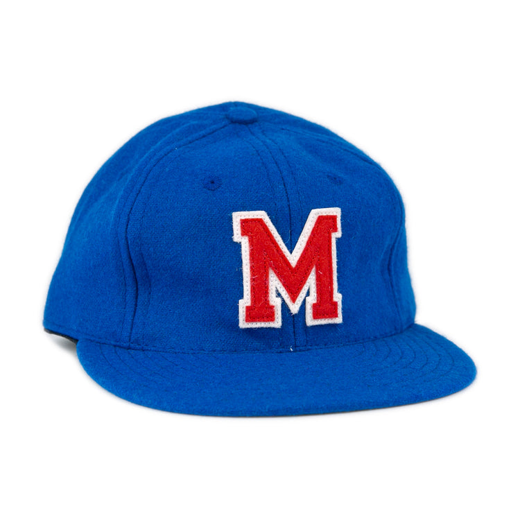 The EFF Southern Methodist University 1962 Vintage Ballcap is a blue wool cap featuring a large red M outlined in white on the front, reminiscent of classic SMU style, displayed against a plain white background.