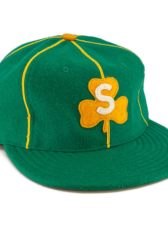 The EFF St. Patrick Shamrocks 1925 Vintage Ballcap is made in the USA with green wool, yellow piping, a yellow top button, and a front yellow clover patch with a white S, capturing the classic vintage style.