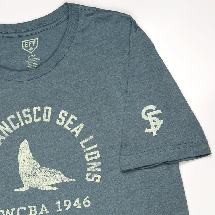 The EFF San Francisco Sea Lions 1946 T-Shirt is a unisex heathered tee with a sea lion graphic and “San Francisco Sea Lions WCBA 1946” on the front, CSA initials on the sleeve, celebrating West Coast Baseball Association history in cotton comfort.