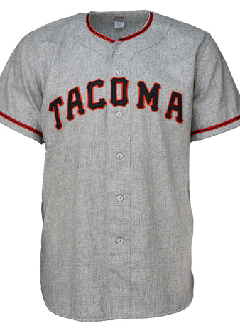 The EFF Tacoma Giants 1960 Road Jersey is a gray baseball jersey with red and black trim, featuring bold red TACOMA lettering outlined in black—ideal for Pacific Coast League fans.