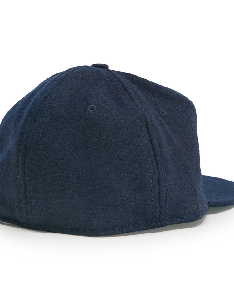 The EFF Tacoma Twins 1974 Vintage Ballcap is a dark blue cap shown from the back, featuring curved panels and a small top button, with no visible logos or adjustment straps.