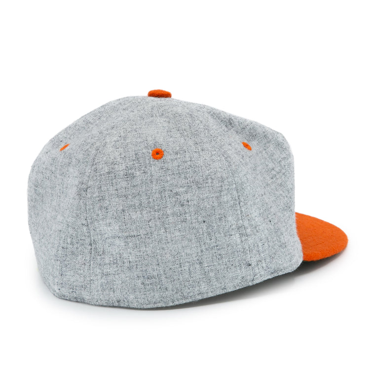 The Ebbets Field Flannels University of Tennessee 1962 Vintage Ballcap, featuring a gray crown, orange eyelets, a top button, and an orange brim, is displayed from the back against a white background.