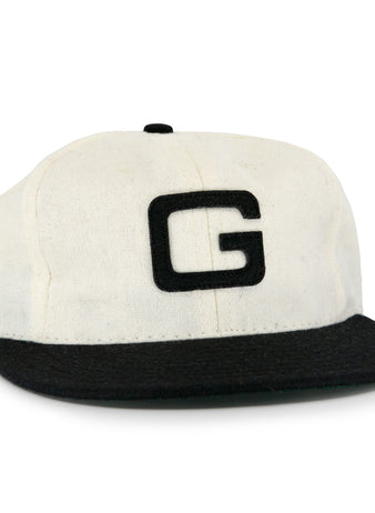 The Tokyo Kyojin (Giants) 1948 Vintage Ballcap by Ebbets Field Flannels features a white crown, black brim, and bold black G on the front, inspired by an authentic 1948 Japanese baseball cap.