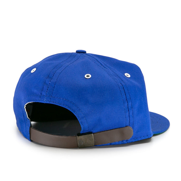 The EFF Trois Rivières Royals Cotton Twill Ballcap is shown from the back, displaying white eyelets and a dark adjustable strap with a metal clasp.