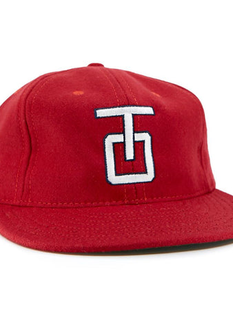 The EFF Tulsa Oilers 1966 Vintage Ballcap is a red wool cap with a flat brim and a white and blue embroidered TG logo on the front.