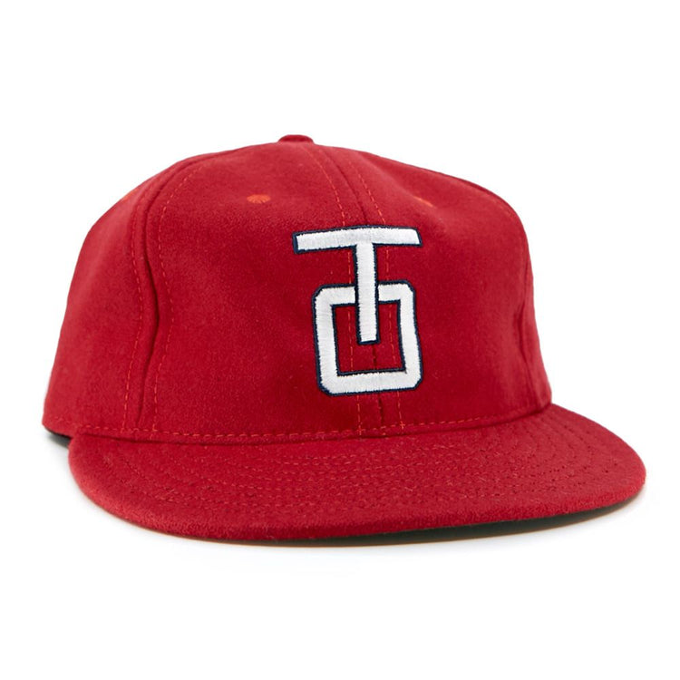 The EFF Tulsa Oilers 1966 Vintage Ballcap is a red wool cap with a flat brim and a white and blue embroidered TG logo on the front.