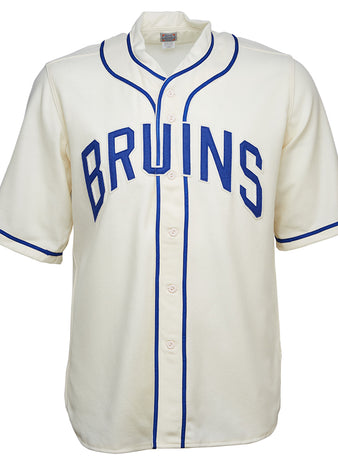 The EFF UCLA 1940 Home Jersey is a white vintage wool flannel with blue piping and BRUINS in bold blue across the chest. It features front buttons and short sleeves, faithfully replicating the original classic baseball look.