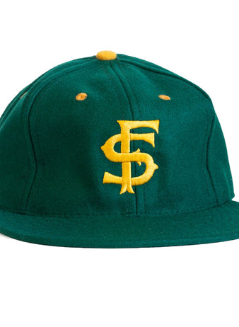 The EFF University of San Francisco 1950 Vintage Ballcap is a green wool hat with a yellow top button and yellow “SF” embroidery—perfect for any collegiate baseball cap collection.