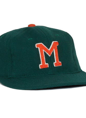 The EFF University of Miami 1958 Vintage Ballcap is a dark green cap with an orange button and a bold orange and white M on the front, inspired by a classic UM design.