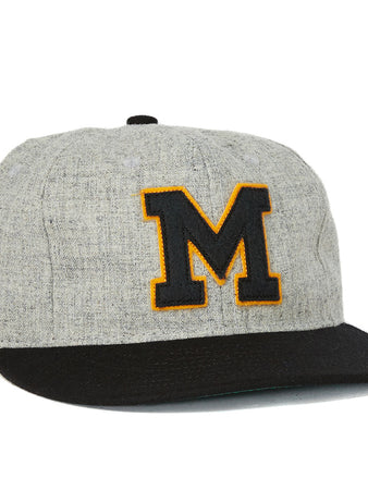 The EFF University of Missouri 1950 Ballcap is an officially licensed vintage gray wool cap with a black brim and a bold black M outlined in yellow on the front, inspired by the original 1950 design.