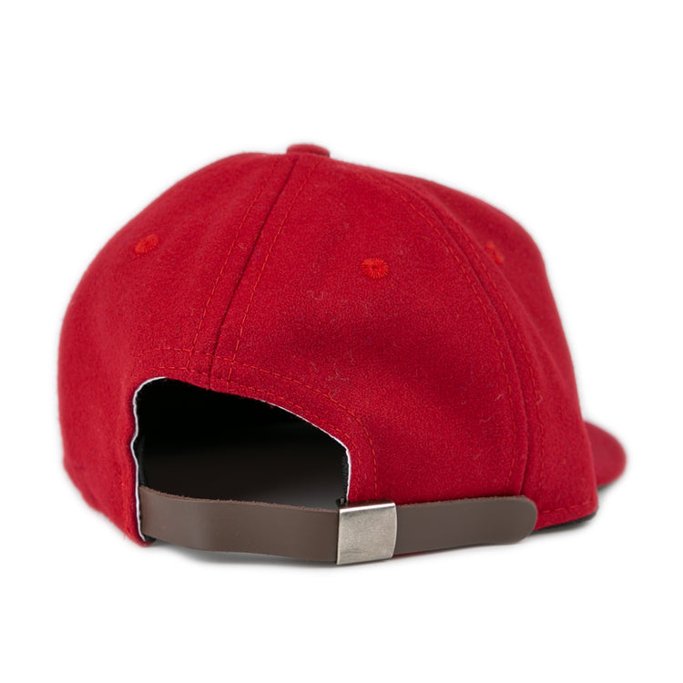 The EFF Virginia Tech 1963 Vintage Ballcap is a red wool baseball cap shown from the back, featuring an adjustable brown leather strap with metal clasp—an officially licensed Collegiate Vault classic.