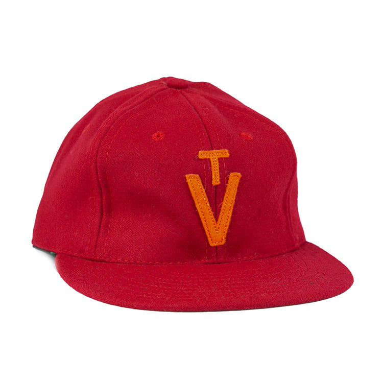 The EFF Virginia Tech 1963 Vintage Ballcap is a wool cap with a flat brim and an orange embroidered TV logo—an officially licensed Collegiate Vault product.
