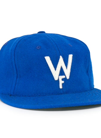 The Wichita Falls Spudders 1956 Vintage Ballcap by EFF is a royal blue wool baseball hat with a white embroidered W over F, classic structured design, and flat brim—perfect for true fans.