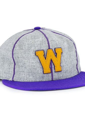 The EFF University of Washington 1938 Vintage Ballcap features gray fabric, a purple brim, purple stitching, and a bold yellow W on the front—a must-have for any UW ballcap collector.
