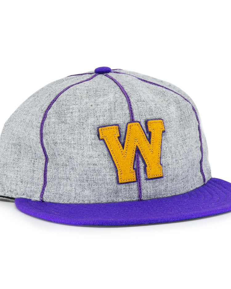 The EFF University of Washington 1938 Vintage Ballcap features gray fabric, a purple brim, purple stitching, and a bold yellow W on the front—a must-have for any UW ballcap collector.